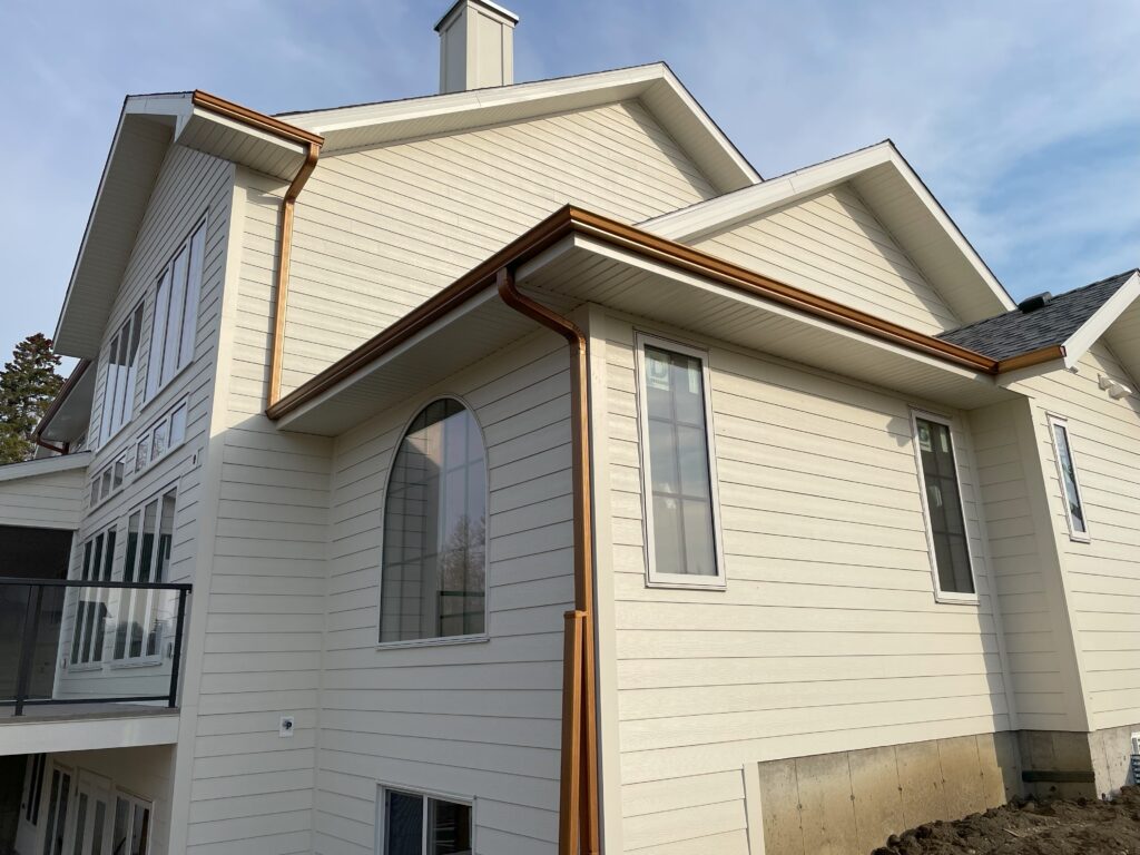 Lux Copper Wave Gutter and Hardie Board Cement Siding