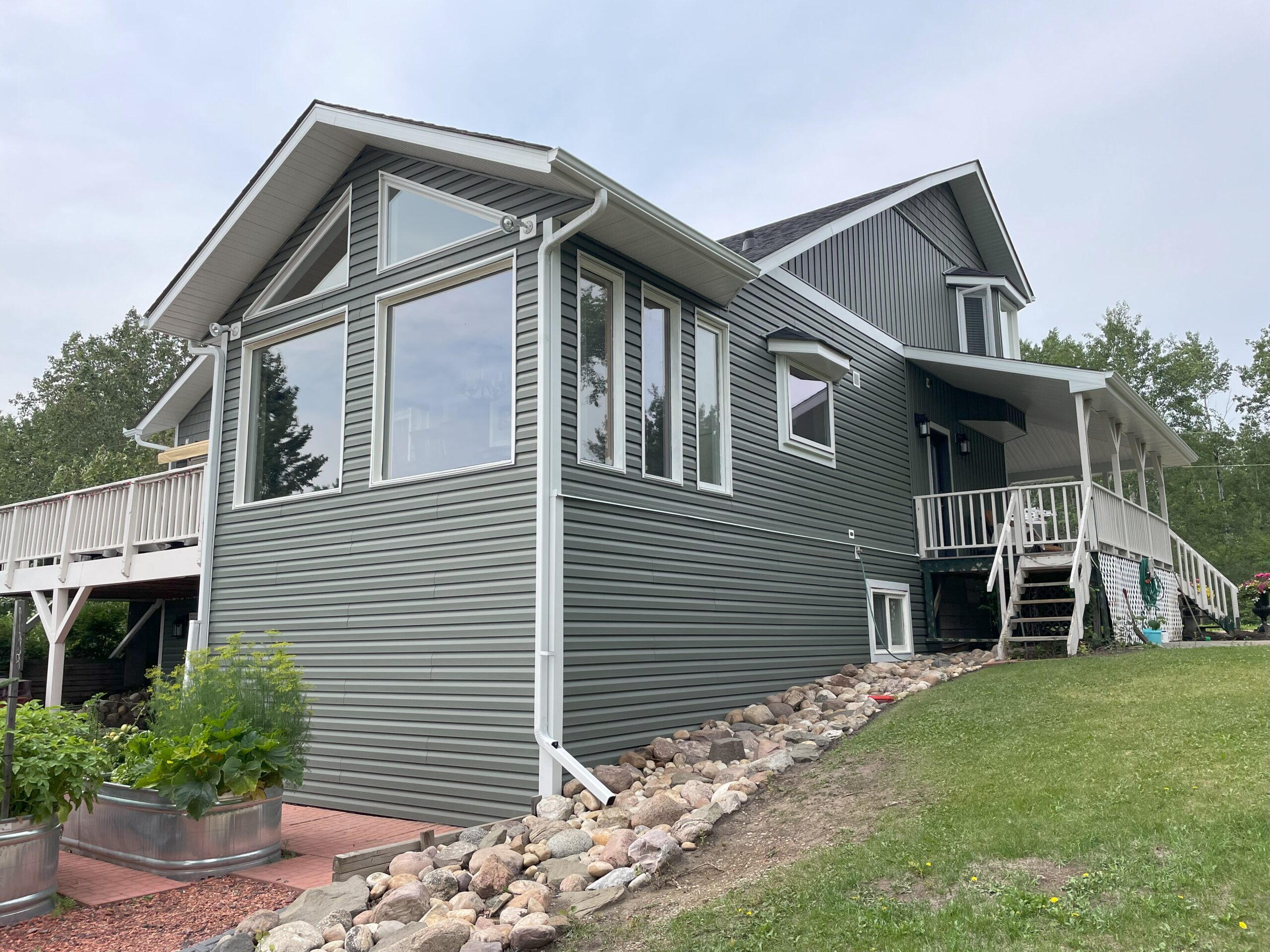 Shamrock Vinyl Siding in Shake, Horizontal, and Board and Batten in Lac Ste. Anne County