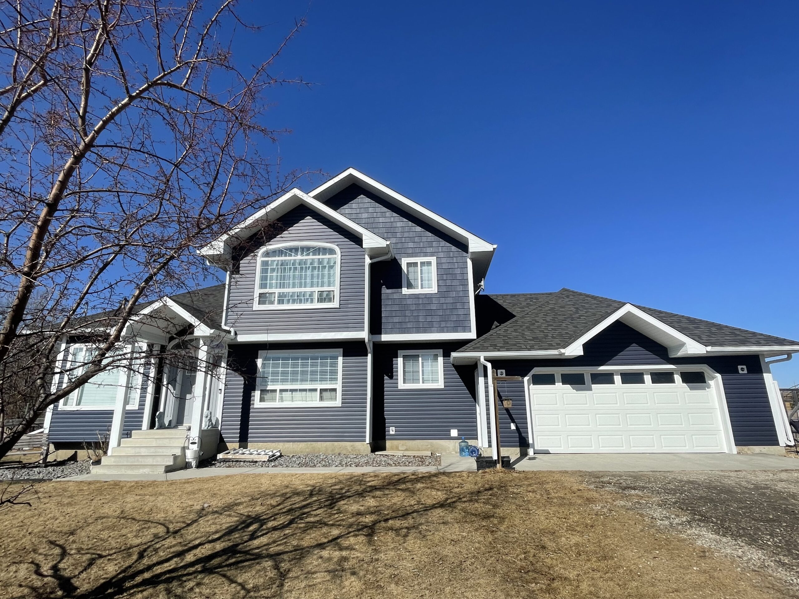 Marine Blue Designer Vinyl Siding and Vinyl Shake in Parkland County