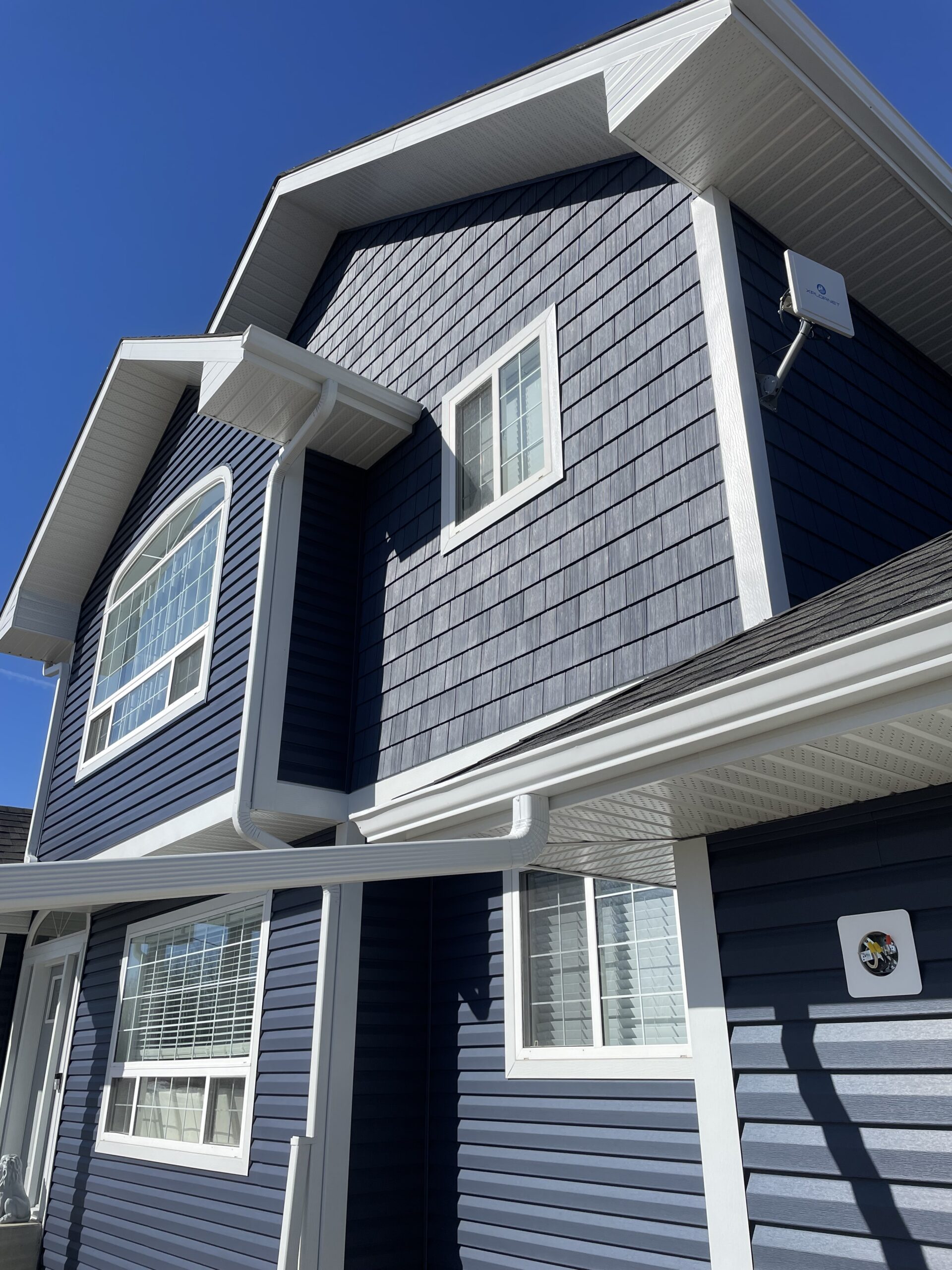 Marine Blue Designer Vinyl Siding and Vinyl Shake in Parkland County